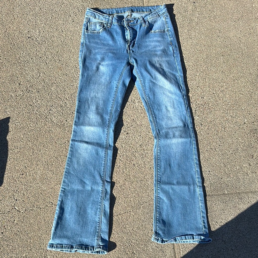 Blue Flare Wide Leg Jeans with Distressing and Frayed Hem